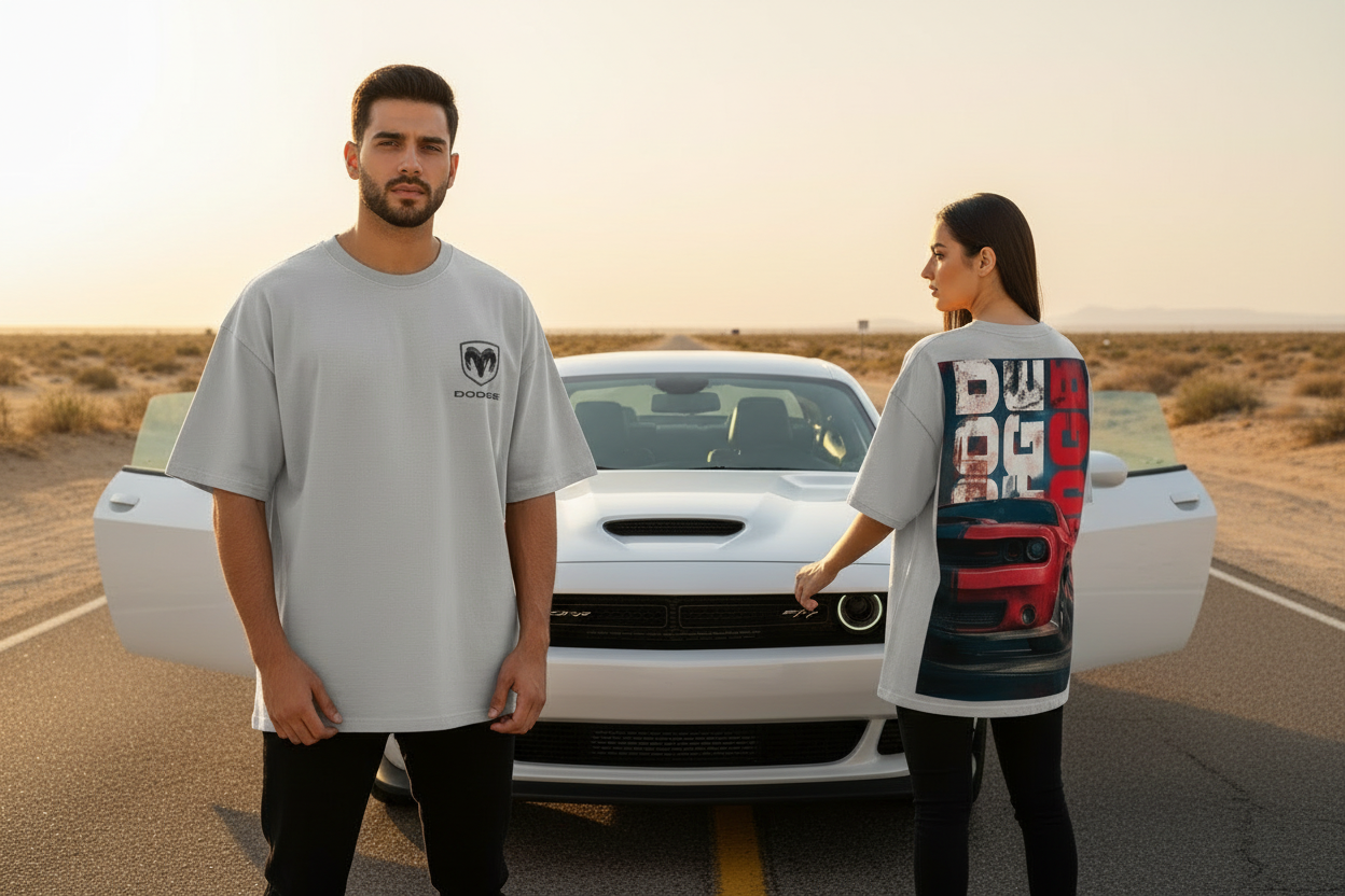 Two models wearing Dodge graphic tee in light grey/silver on a desert highway holding car doors